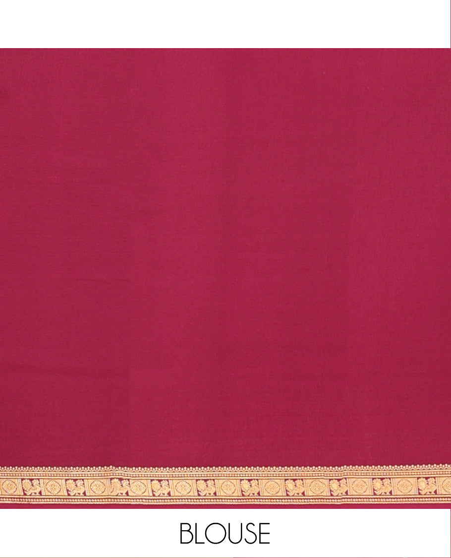 Green Mysore Silk Saree Prettified with Zari Buttas All Over Its Body, Complemented by Captivating Contrast Border of Traditional Zari Designs, Zari Designs Woven Pallu, and Paired with a Contrast Blouse