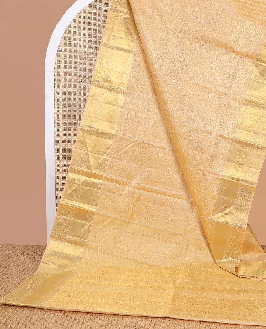 Cream floral vine design silk saree with self border of intricate zari design border & floral design pallu