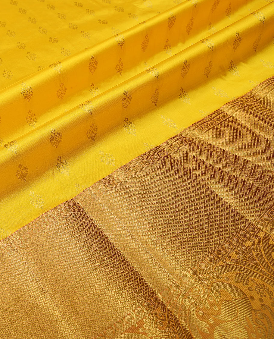yellow floral buttas pure silk half saree with contrast intricate zari design border, zari design blouse & floral zari design dhavani