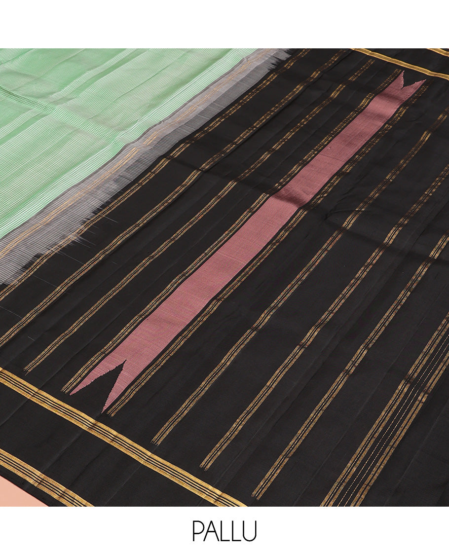 Green micro-checked Kanchipuram silk saree, contrast thazampoo rekku border, and zari striped pallu