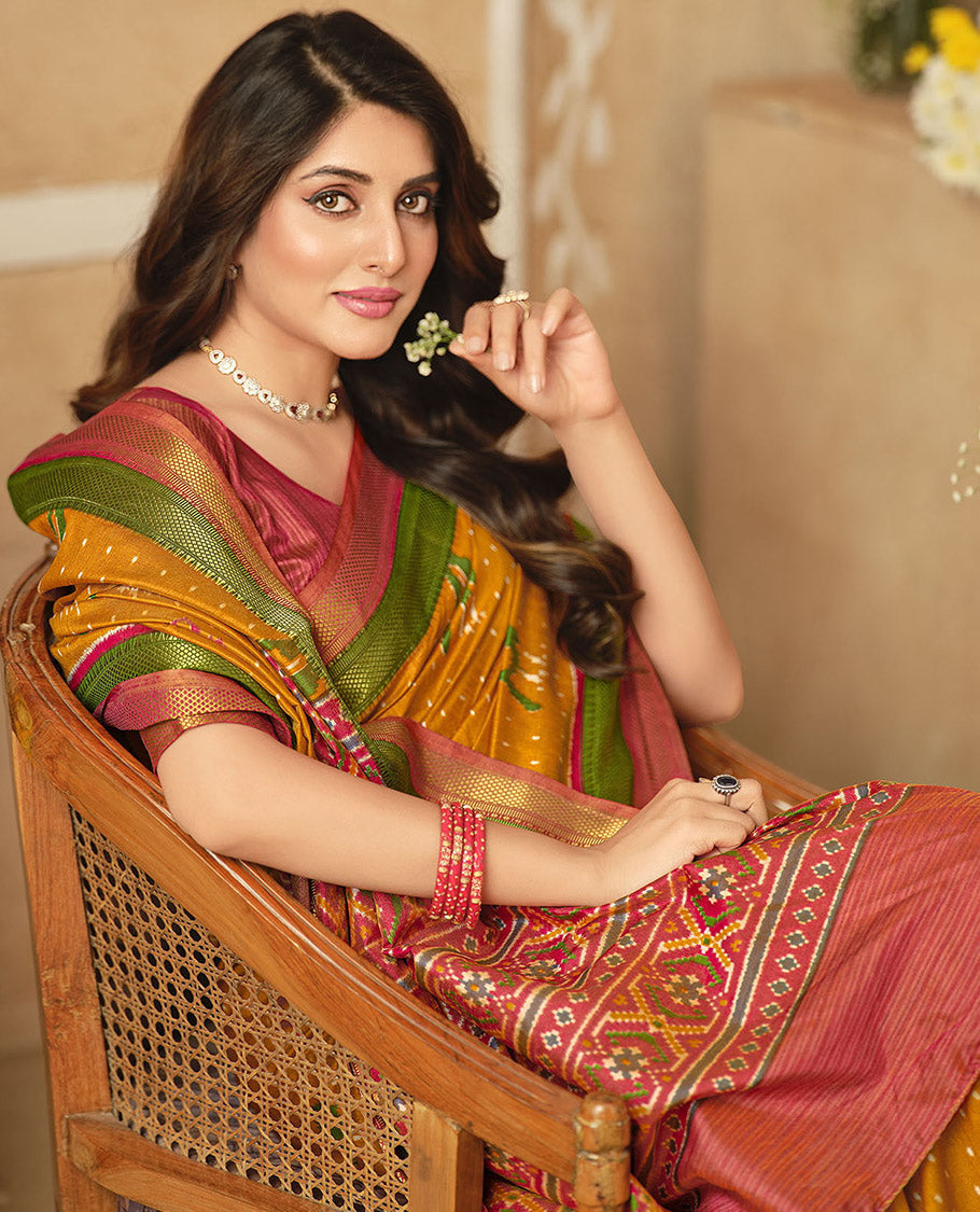 Orange Fancy Raw Silk Designer Saree, Elevated with Ikat Butta and Bird Buttas, a Contrast Traditional Border, a Patola-Printed Pallu, and a Contrast Blouse