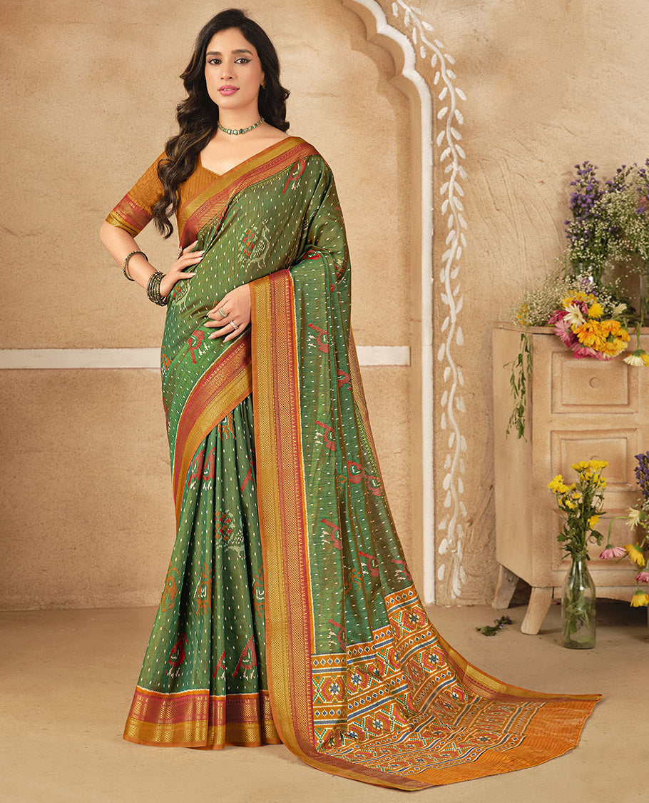 Green Fancy Raw Silk Designer Saree, Enthralled with Ikat Butta and Bird Buttas, a Contrast Traditional Border, a Patola-Printed Pallu, and a Contrast Blouse
