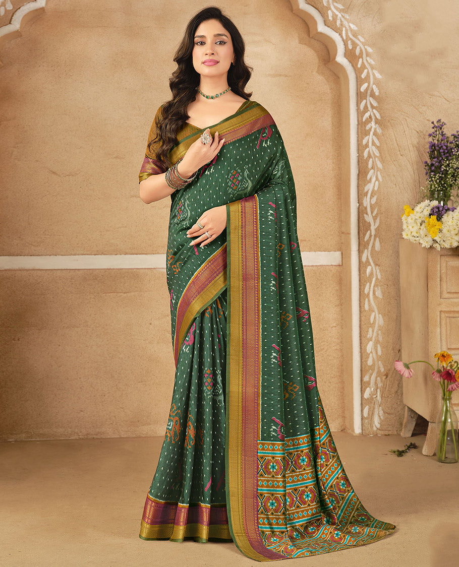 Green Fancy Raw Silk Designer Saree, Decked Up with Ikat Butta and Bird Buttas, a Contrast Traditional Border, a Patola-Printed Pallu, and a Contrast Blouse
