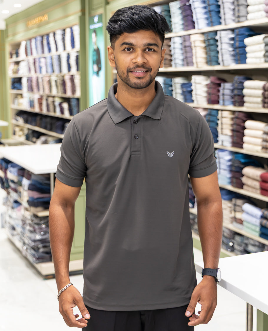 Black Plain Cotton-Blended Polo T-Shirt Comes with Half Sleeves, a Slim Fit, Cuban Collar, and Regular Length