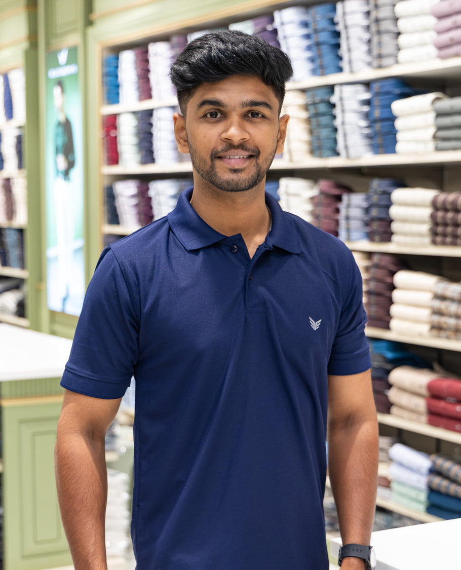 Navy Plain Cotton-Blended Polo T-Shirt Comes with Half Sleeves, a Slim Fit, Cuban Collar, and Regular Length