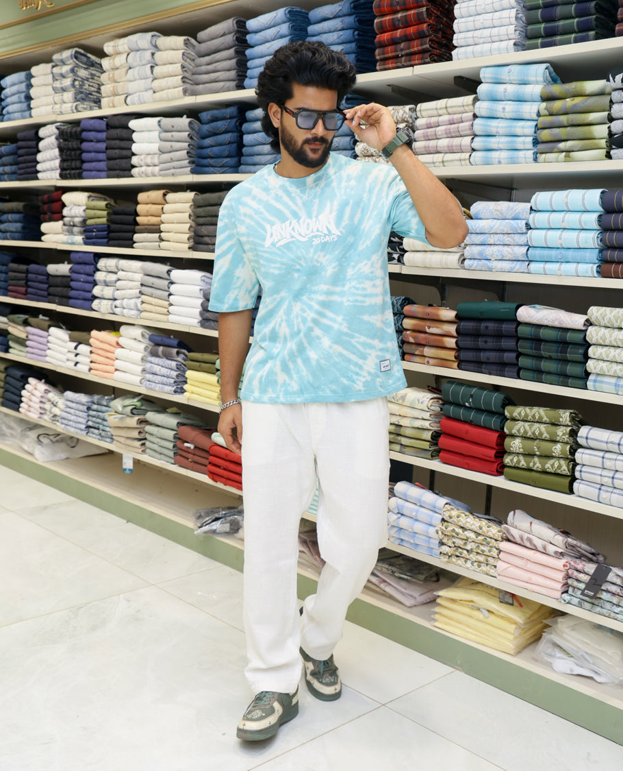Teal Cotton-Blended T-shirt Features Shibori Print, Typography Print on Chest, Half Sleeves, Round Neck, Slim Fit and Regular Length