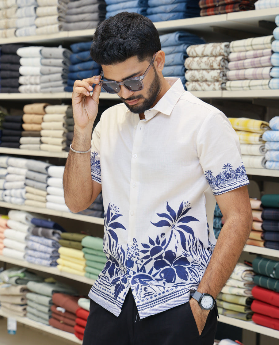 Cream Cotton-Blended Casual Shirt Features Tropical Floral Print, Half-Sleeves, a Spread Collar, Regular Fit and Regular Length