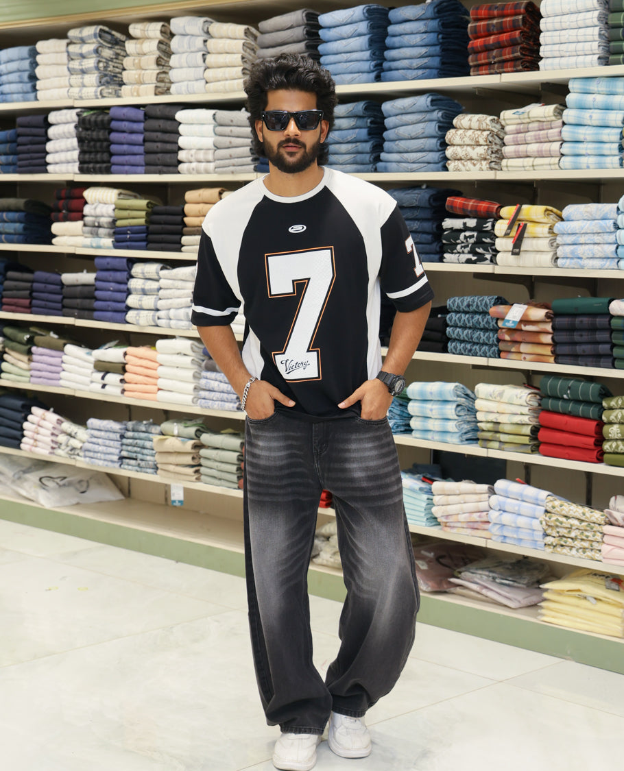 Black Cotton-Blended Oversized Printed Jersey-Style T-shirt Comes with Half-Sleeves, Round Neck, and Regular Length