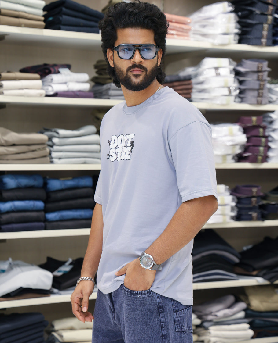 Grey Cotton-Blended T-shirt Features Funky and Bold Motifs Print, Half-Sleeves, Oversized Fit, Round Neck, and Regular Length
