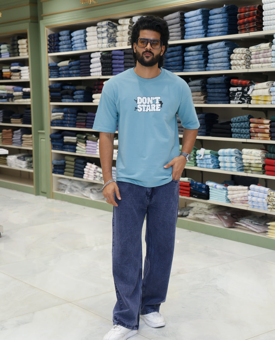 Teal Cotton-Blended T-shirt Features Funky and Bold Motifs Print, Half-Sleeves, Oversized Fit, Round Neck, and Regular Length