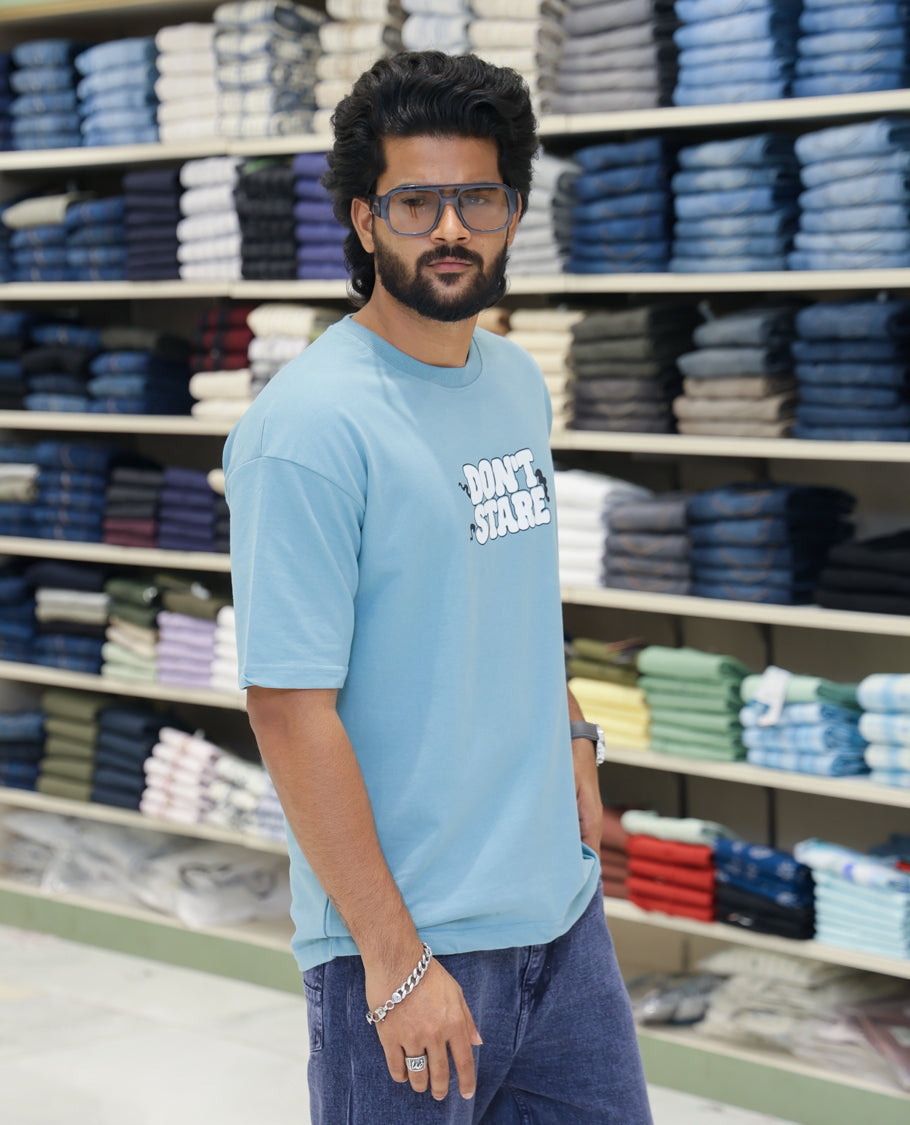 Teal Cotton-Blended T-shirt Features Funky and Bold Motifs Print, Half-Sleeves, Oversized Fit, Round Neck, and Regular Length