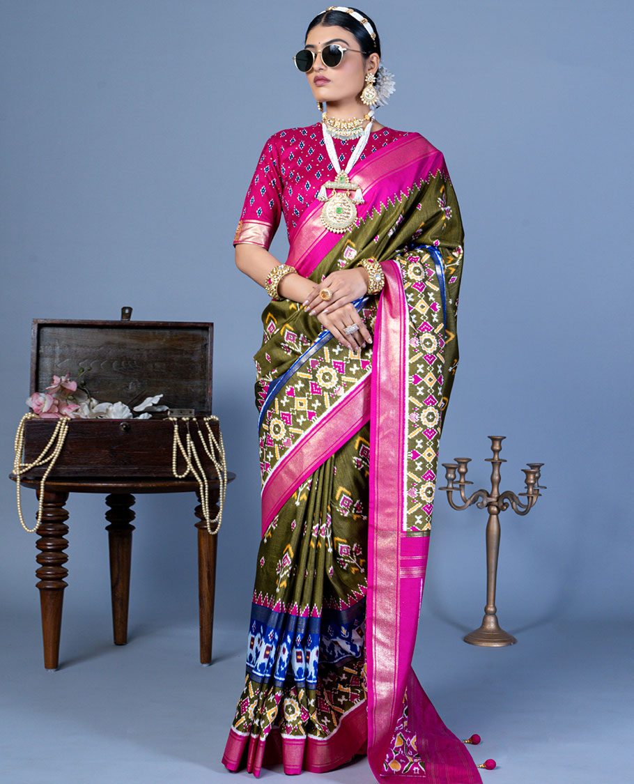Mehendi green patola floral motifs designer saree, contrast temple border, and patola printed pallu