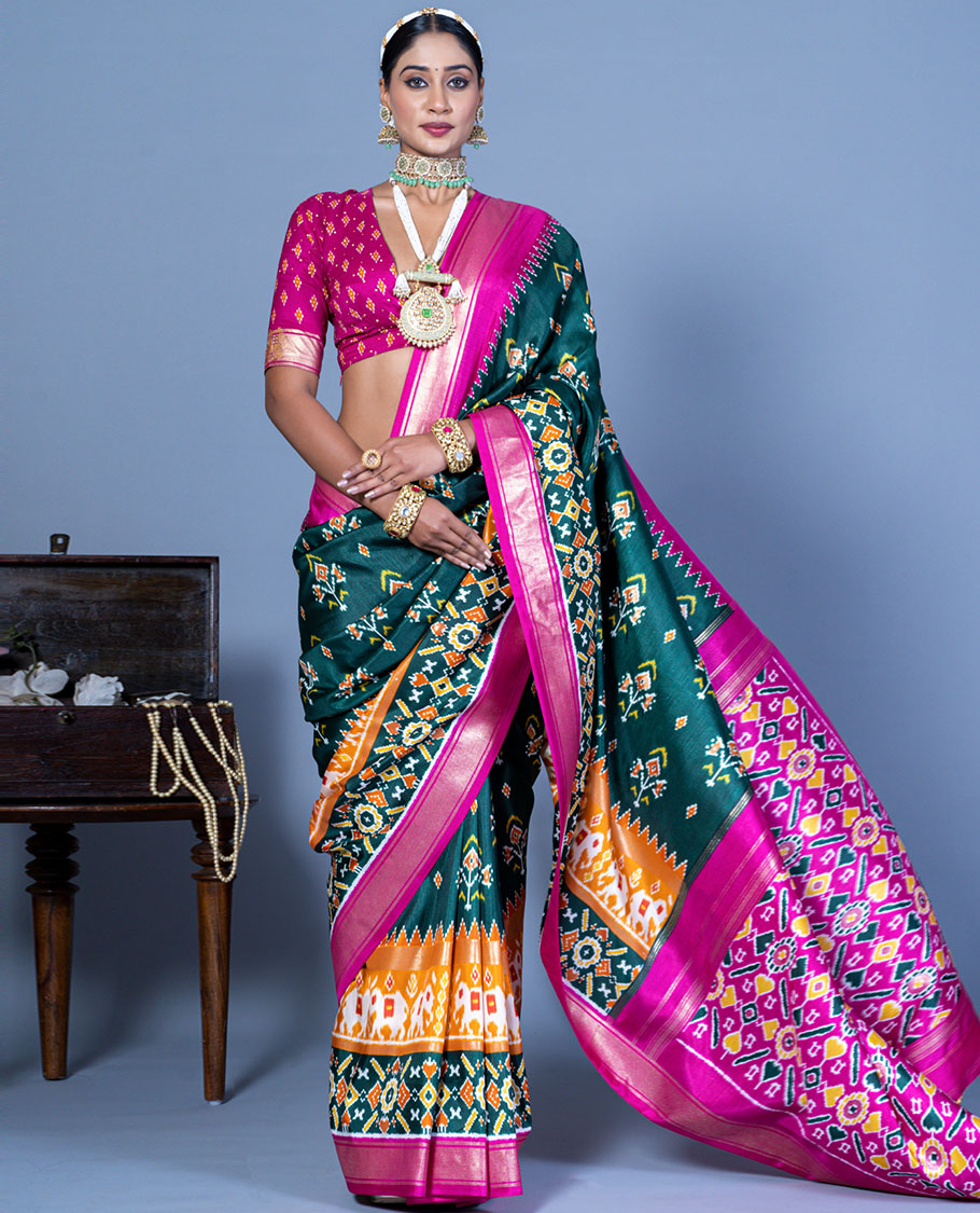 Green patola floral motifs designer saree, contrast temple border, and patola printed pallu