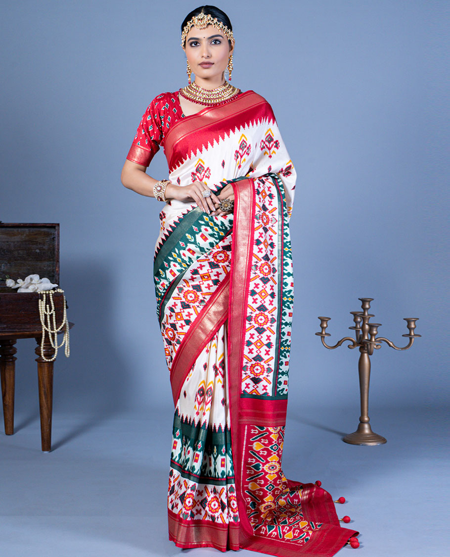 White patola floral motifs designer saree, contrast temple border, and patola printed pallu