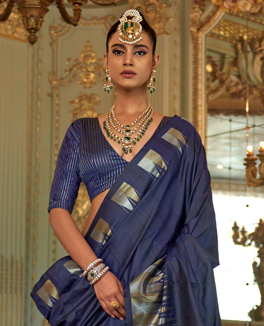 Navy Blue Plain Designer Saree, Complemented by a Gleaming Temple Zari Border, Scintillating Zari Decked Up Pallu, and Comes with a Matching Blouse