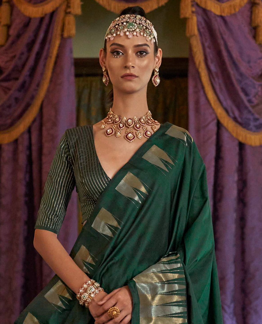 Dark Green Plain Designer Saree, Complemented by a Gleaming Temple Zari Border, Scintillating Zari Decked Up Pallu, and Comes with a Matching Blouse