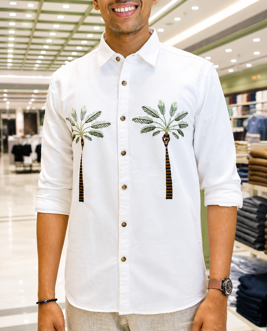 White Cotton-Blended Casual Shirt, Artfully Designed with Palm Tree Motifs Embroidery, Featuring a Spread Collar, Full Sleeves, Slim Fit, and Regular Length