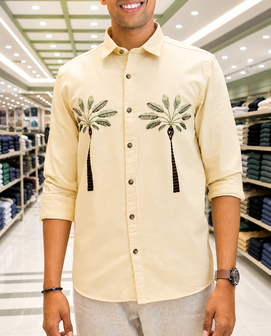 Cream Cotton-Blended Casual Shirt, Artfully Designed with Palm Tree Motifs Embroidery, Featuring a Spread Collar, Full Sleeves, Slim Fit, and Regular Length