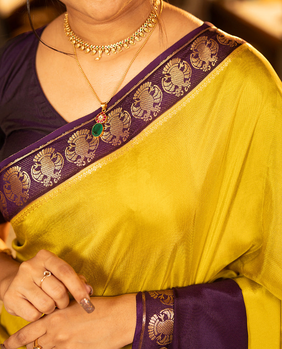 Mustard Plain Dola Silk Saree, Complemented by Contrast Rettai Pettu Ganda Berunda Motifs, Zari Border, Gleaming Zari Striped Pallu, and Paired with a Contrast Blouse