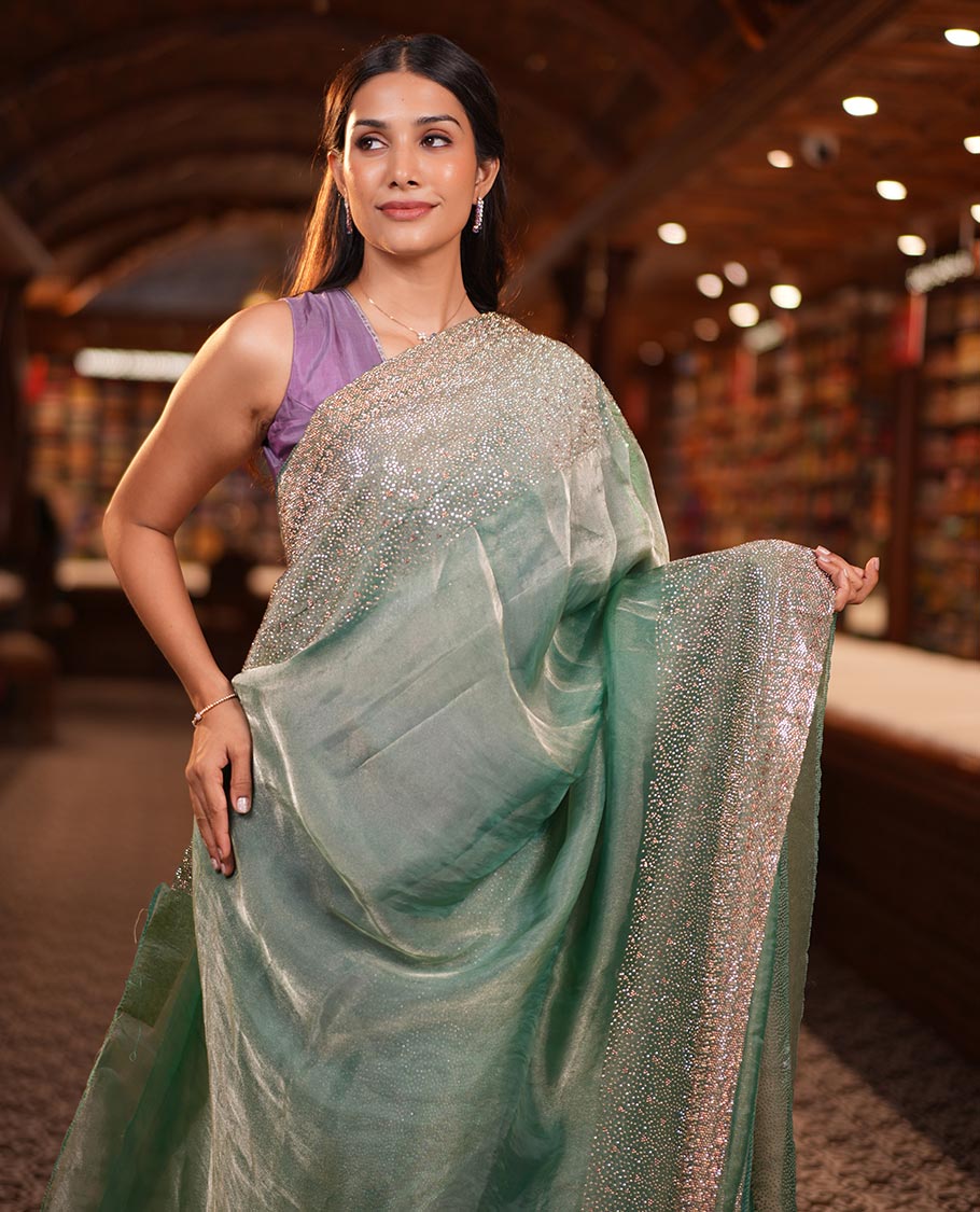 Emerald Green Fendi Silk Saree with Swarovski Stonework Border, and a Stonework Blouse