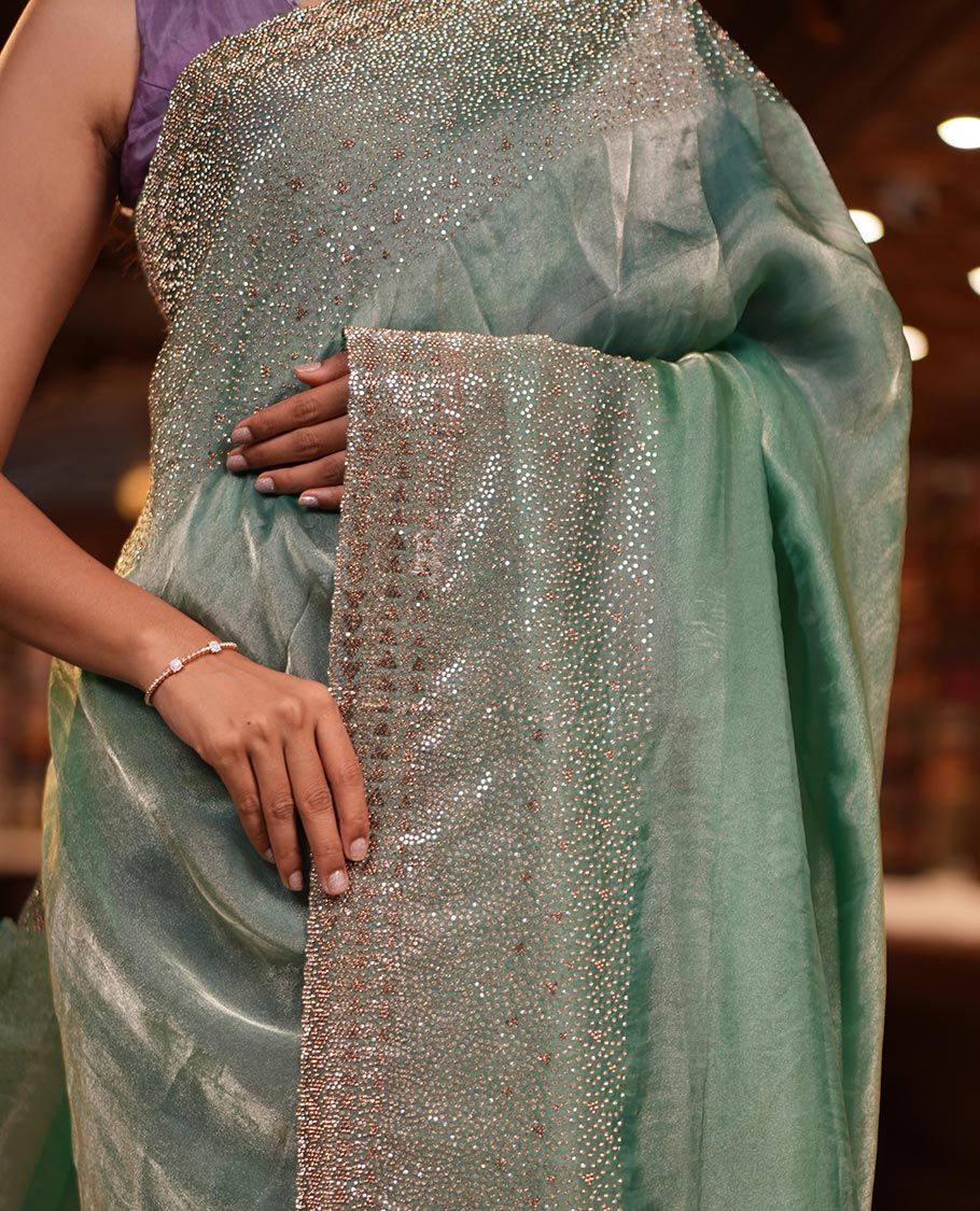 Emerald Green Fendi Silk Saree with Swarovski Stonework Border, and a Stonework Blouse