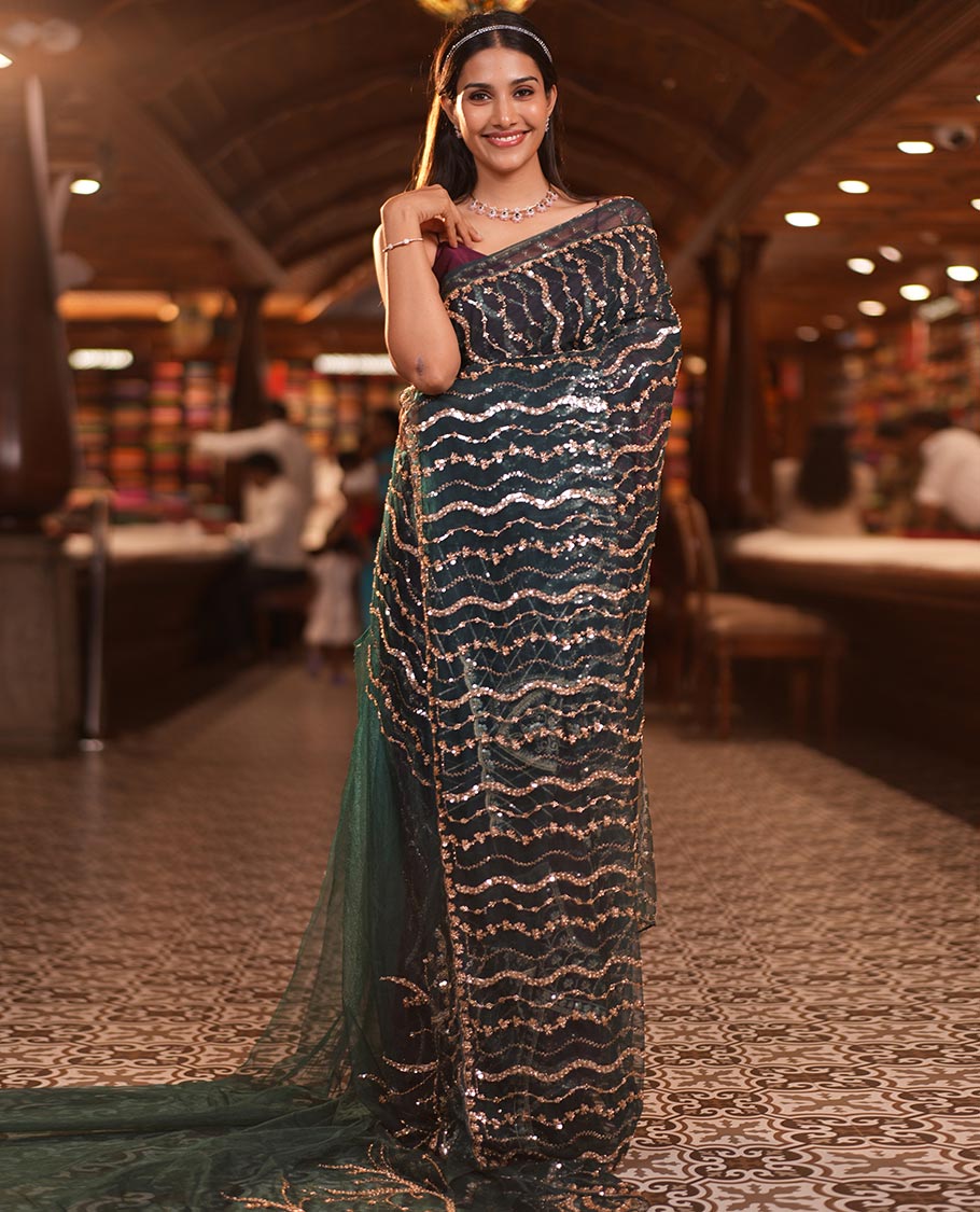Teal Blue Zig-Zag Sequin Striped Net Designer Saree with a Matching Blouse