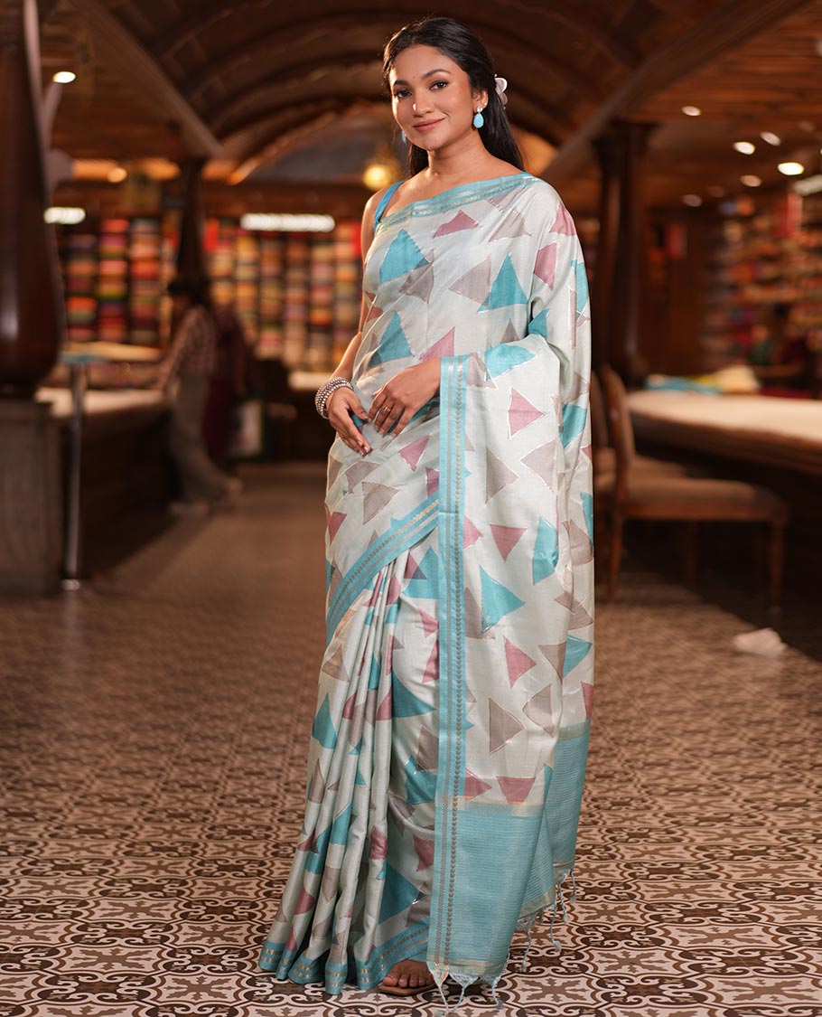 Sky Blue Fancy Tussar Silk Saree Features Triangle Motifs, Zari Border, Striped Pallu, Matching Blouse