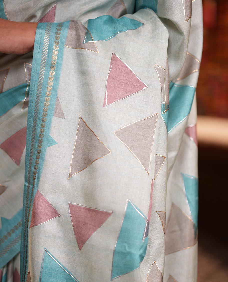 Sky Blue Fancy Tussar Silk Saree Features Triangle Motifs, Zari Border, Striped Pallu, Matching Blouse