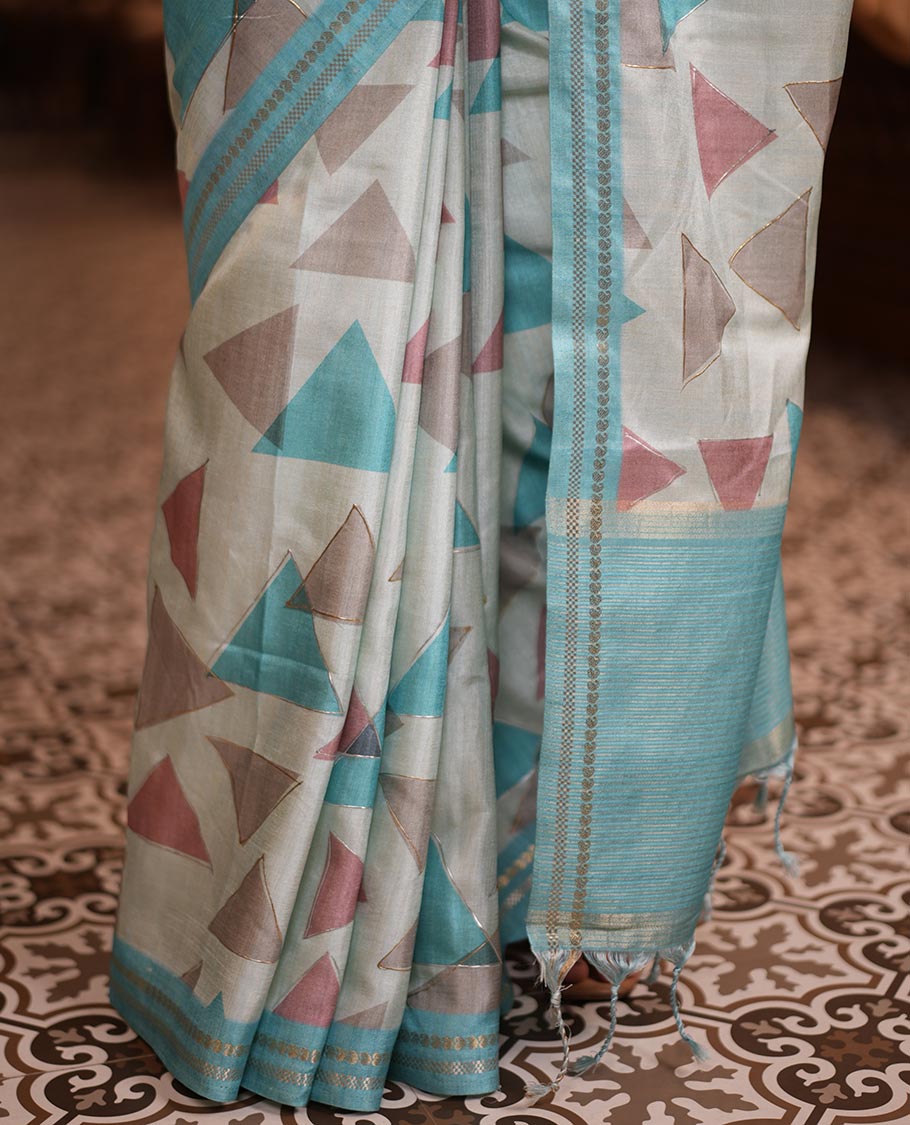 Sky Blue Fancy Tussar Silk Saree Features Triangle Motifs, Zari Border, Striped Pallu, Matching Blouse