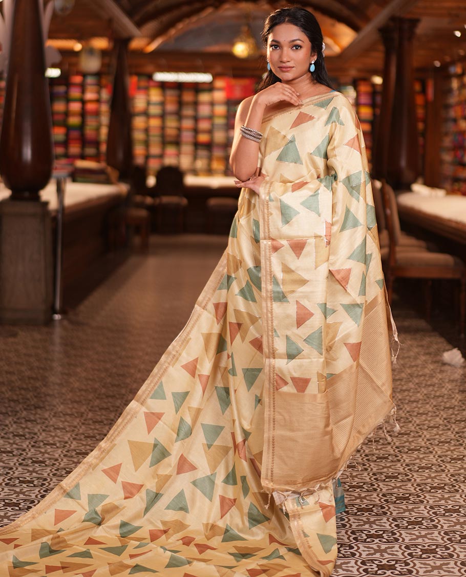 Light Yellow Fancy Tussar Silk Saree Features Triangle Motifs, Zari Border, Striped Pallu, Matching Blouse