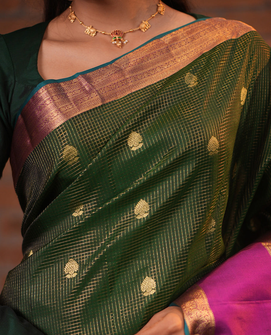 Dark Green-Magenta Vasundhara Silk Saree Features Zari Buttas and Checks,Contrast Thazampoo Rekku Rettai Pettu Mayil Border, Grand Pallu, and Contrast Blouse