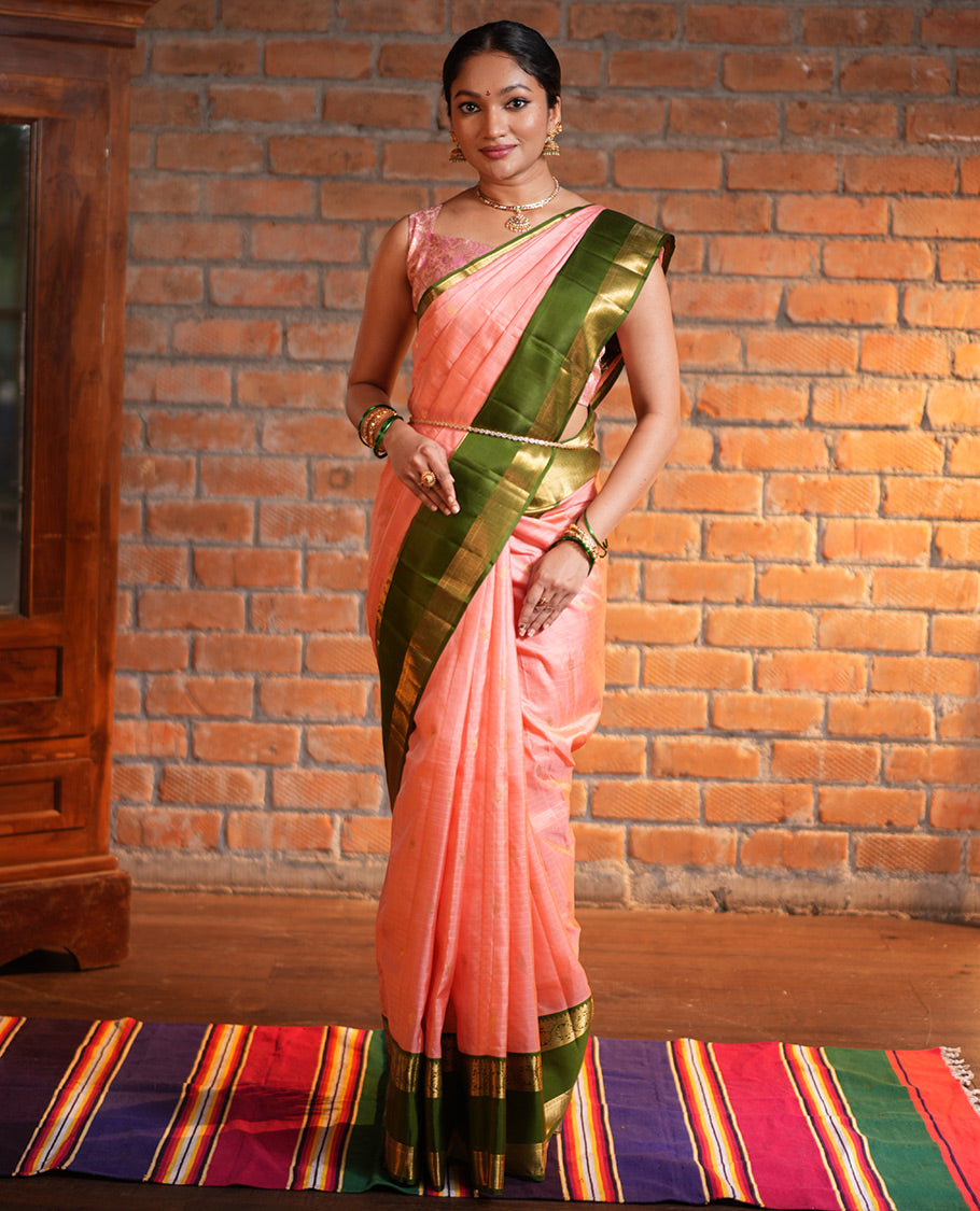 Pink Vasundhara Silk Saree, Finely Crafted with Zari Buttas and Checked Design, Complemented by a Contrast One-Sided Rettai Pettu Border of Rekku, Laddu Kamalam, Mayil Kann and Kodi Visiry Designs, Grand Jaal Pallu, and Paired with a Contrast Blouse