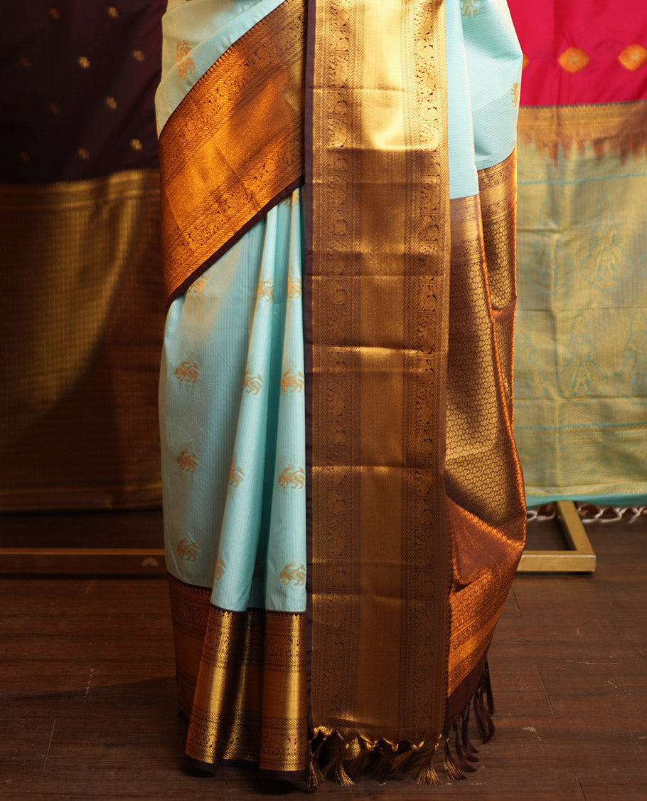 Blue Budget Silk Saree, Beautified with Zari Buttas and Zari Stripes on Its Body, Complemenetd by a Contrast Traditional Zari Border of Peacock-Elephant Designs, a Grandly Embellished Border, and Paired with a Contrast Blouse