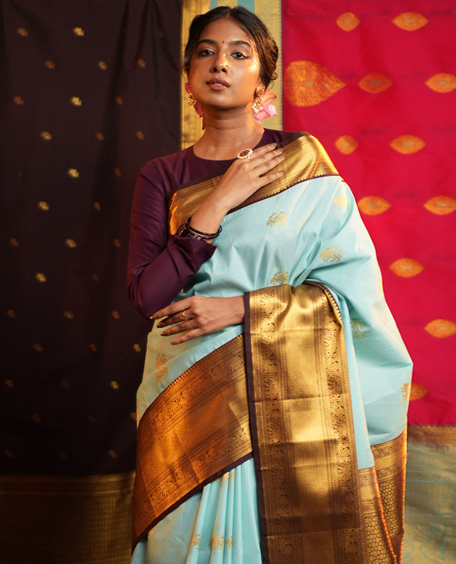 Blue Budget Silk Saree, Beautified with Zari Buttas and Zari Stripes on Its Body, Complemenetd by a Contrast Traditional Zari Border of Peacock-Elephant Designs, a Grandly Embellished Border, and Paired with a Contrast Blouse