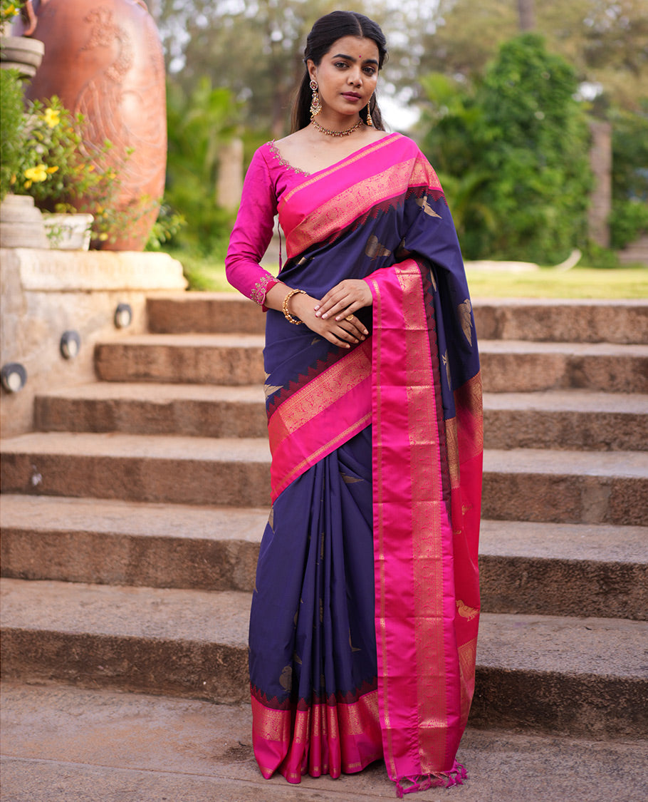 Navy Blue Parrot Motif Budget Silk Saree, a Contrast Rettai Pettu Border, and a Contrast Blouse