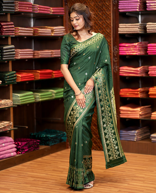 Bottle green patola style zari butta dola silk saree with patola zari design border & rich pallu along with plain blouse
