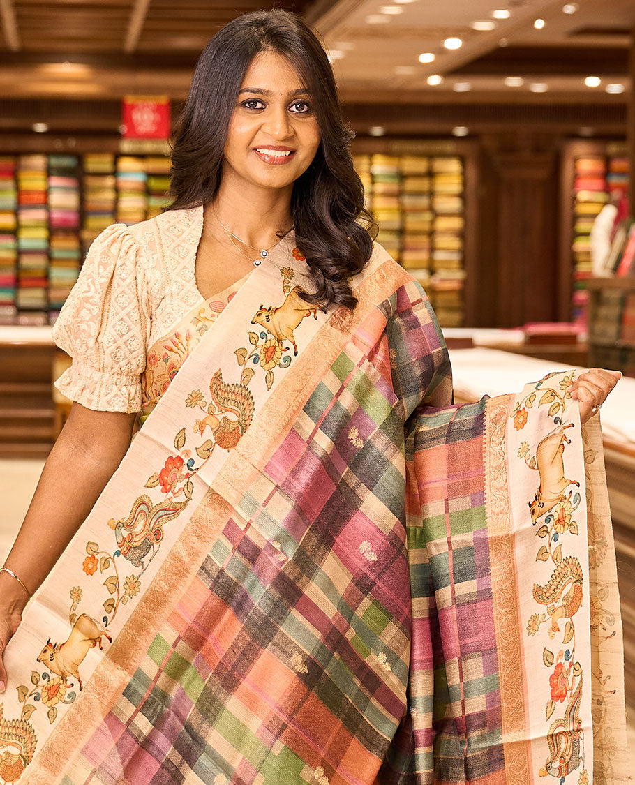 Multi-color checked & buttas tussar silk saree, contrast printed border of kalamkari peacock, floral & Pichwai cow & zari-rich pallu