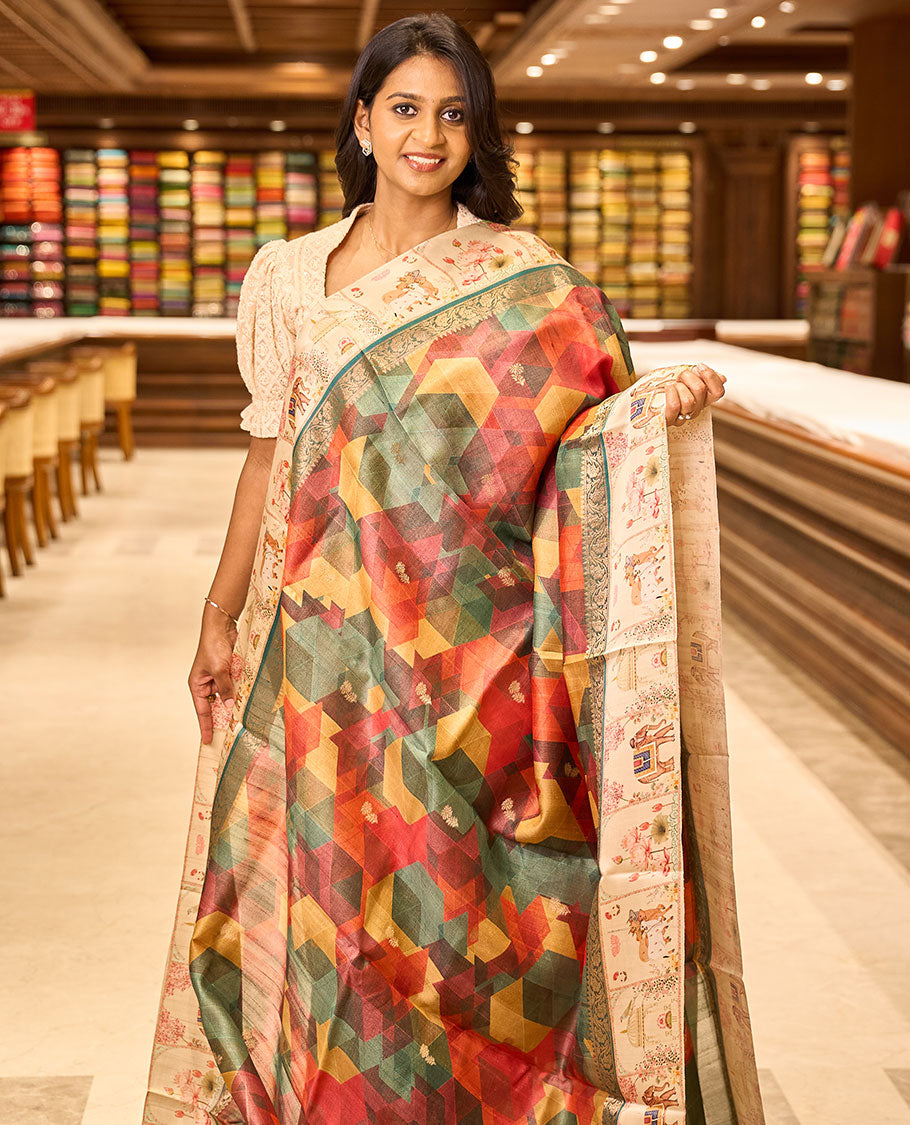 Multi-color geometric print & zari buttas tussar silk saree, contrast zari border with printed Pichwai cow, lotus & elephant motifs & zari pallu