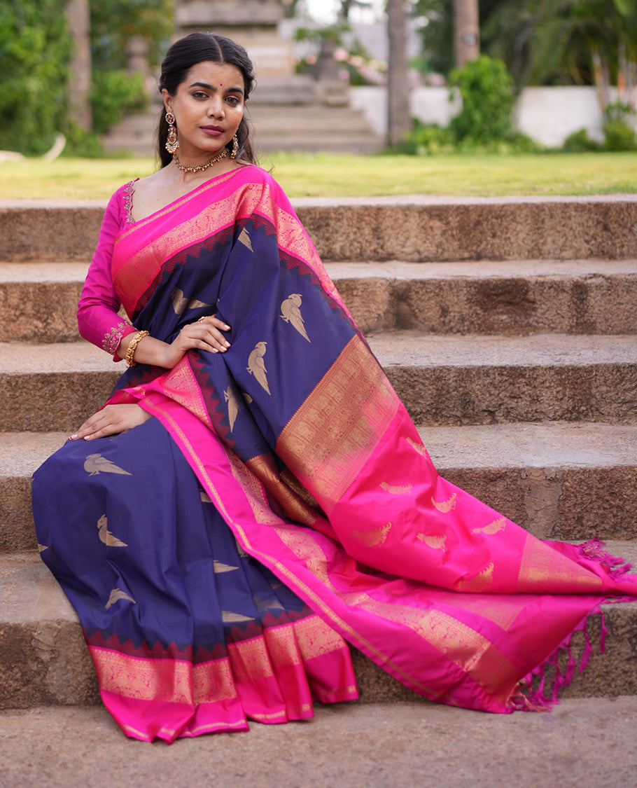 Navy Blue Parrot Motif Budget Silk Saree, a Contrast Rettai Pettu Border, and a Contrast Blouse