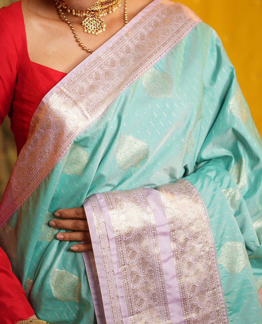 Blue Budget Silk Saree, Steeped in the Richness of Zari Buttas All Over Its Body, Complemented by Contrast Varisai Pettu Traditional Zari Design Border, an Intricately Designed Pallu, and Paired with a Contrast Blouse