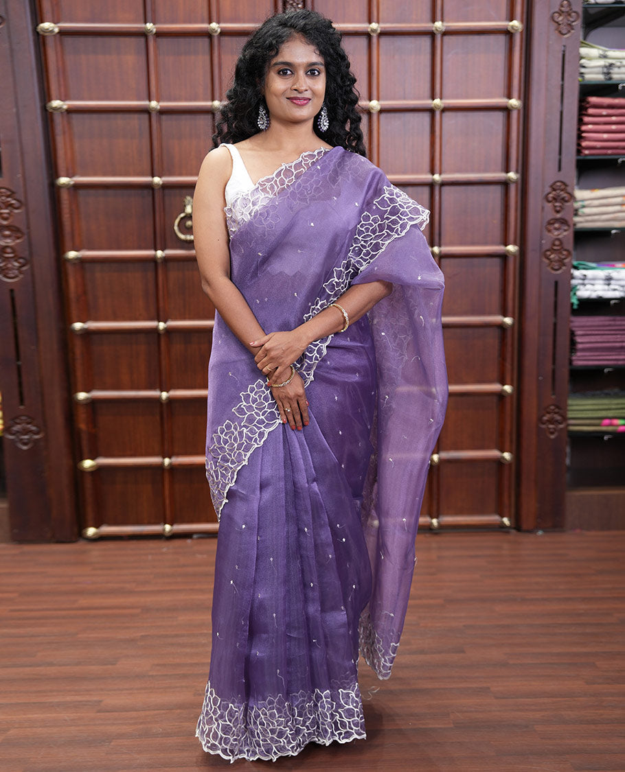 Lavender Organza Saree, Subtly Sparkled with Embroidered Buttas Across Its Body, Highlighted by a Scallop Floral Thread Embroidered Border, a Self-Pallu, and Paired with a Matching Blouse