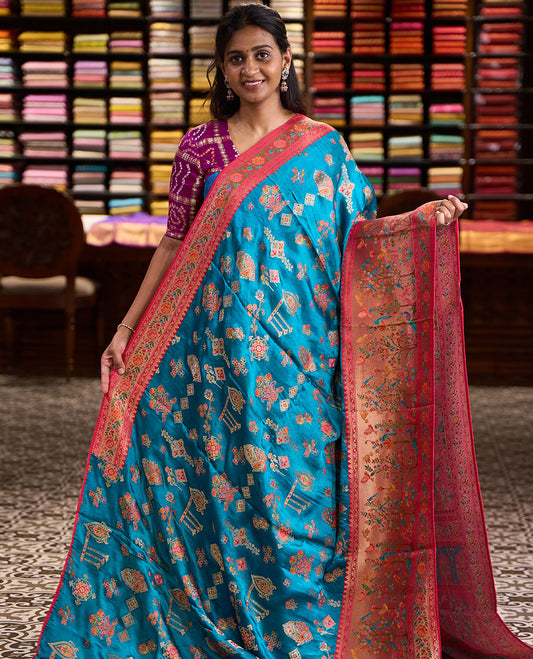 Blue meenakari-style floral printed dola satin silk saree, contrast Tree of life with birds printed border & Mughal-style pallu