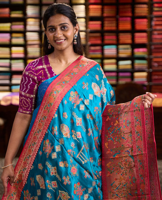 Blue meenakari-style floral printed dola satin silk saree, contrast Tree of life with birds printed border & Mughal-style pallu