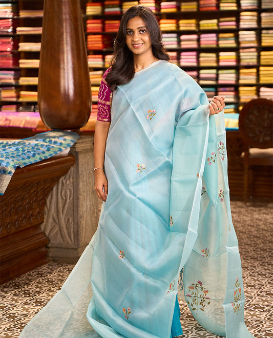 Borderless sky blue floral motifs hand-painted organza silk saree, colorful hand-painted floral motif pallu
