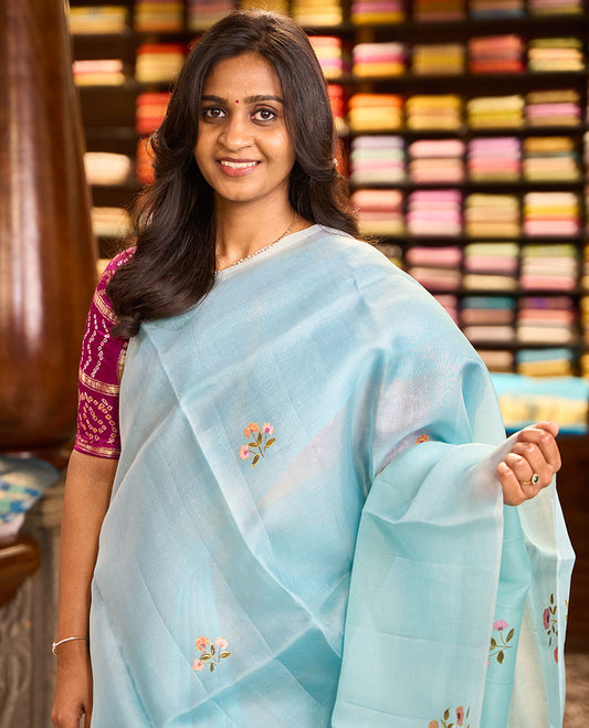 Borderless sky blue floral motifs hand-painted organza silk saree, colorful hand-painted floral motif pallu