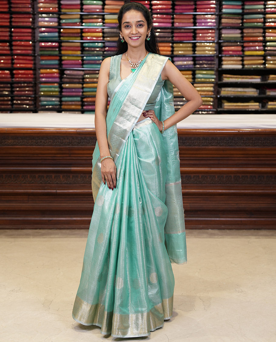 Sea green zari butta design banaras tissue silk saree with almond zari jacquard border & chit pallu along with running blouse