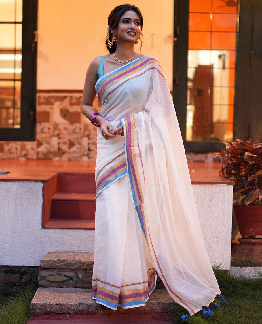 Cream Khadi Mul Cotton Saree, Complemented by a Contrast Multi-Colored Zari Striped Border, and a Matching Blouse