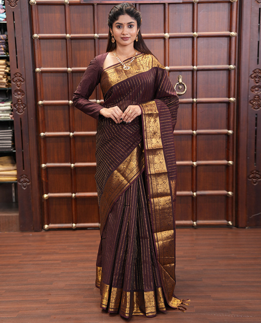 Brown Chettinad Cotton Saree, Spotlighted with Zari Stripes, Traditional Peacock-Chakram Border, Traditional Pallu, and a Matching Blouse
