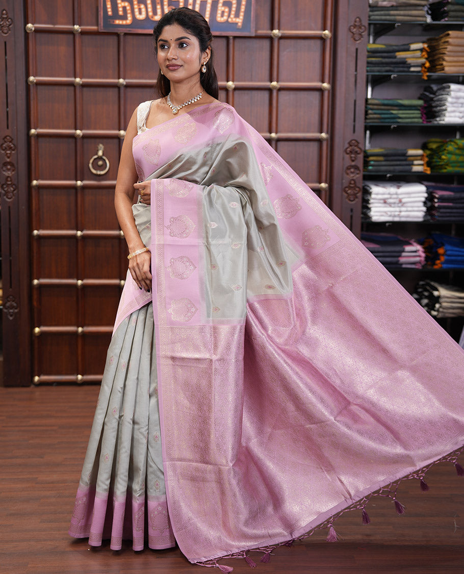 Steel Grey Elite Soft Silk Saree, Enriched with Zari Buttas, Contrast Intricate Motifs Woven Border, Intricate Pallu, and a Contrast Blouse