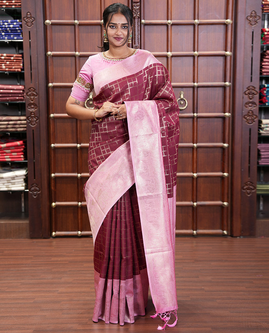 Maroon Elite Soft Silk Saree, Enriched with Checked Design on Its Body, Complemented by a Contrast Border of Jungle-Themed Flora-Fauna Motifs, a Pallu of Checked Design, and Paired with a Contrast Blouse